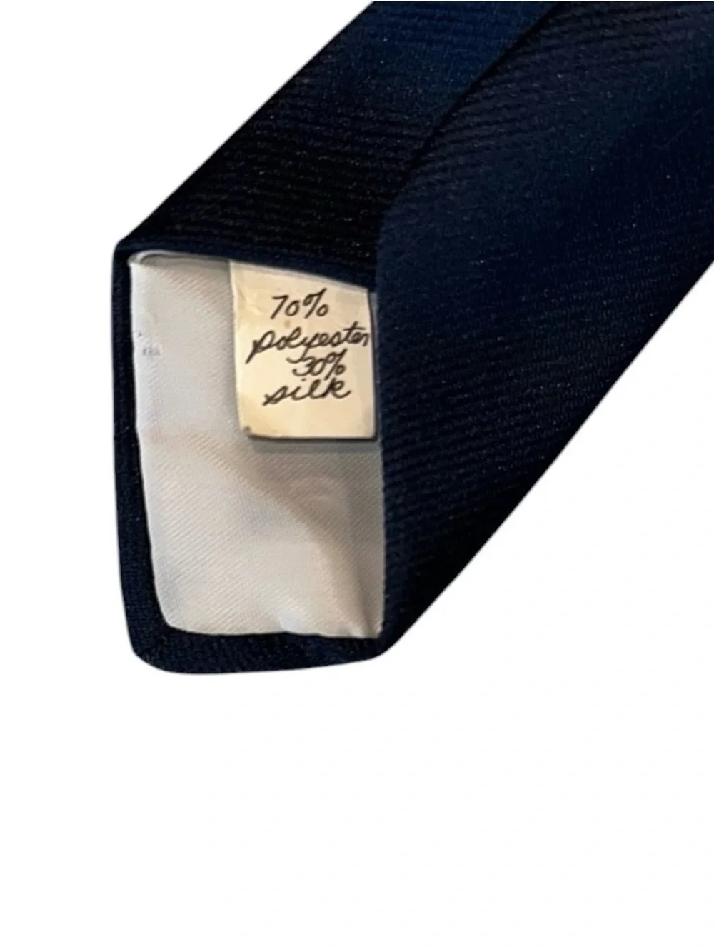 Oscar de la Renta tie gently